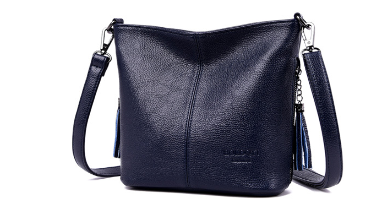 bolsa couro artesanal, bolsa couro crossbody, bolsa couro elegância, bolsa couro premium, bolsa couro refinada, bolsa crossbody sofisticada, bolsa de couro luxo, bolsa de luxo feminina, bolsa de ombro luxuosa